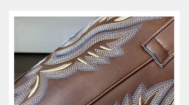 Brown embroidered cowboy boots with mid-calf height and cushioned insole