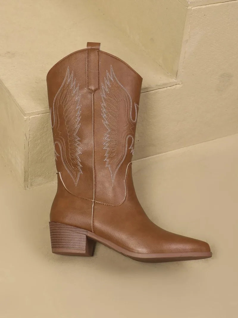 Western cowboy boots with artistic embroidered accents and comfortable low heel