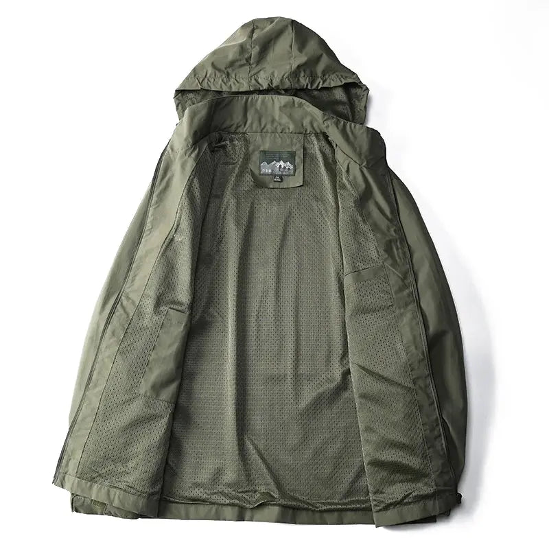 Close-up of the windbreaker’s high-quality fabric, emphasizing its windproof and water-resistant features.