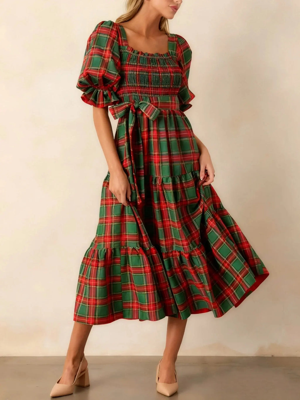 A-line silhouette of the Captivate in Plaid dress, elegantly flattering the figure.