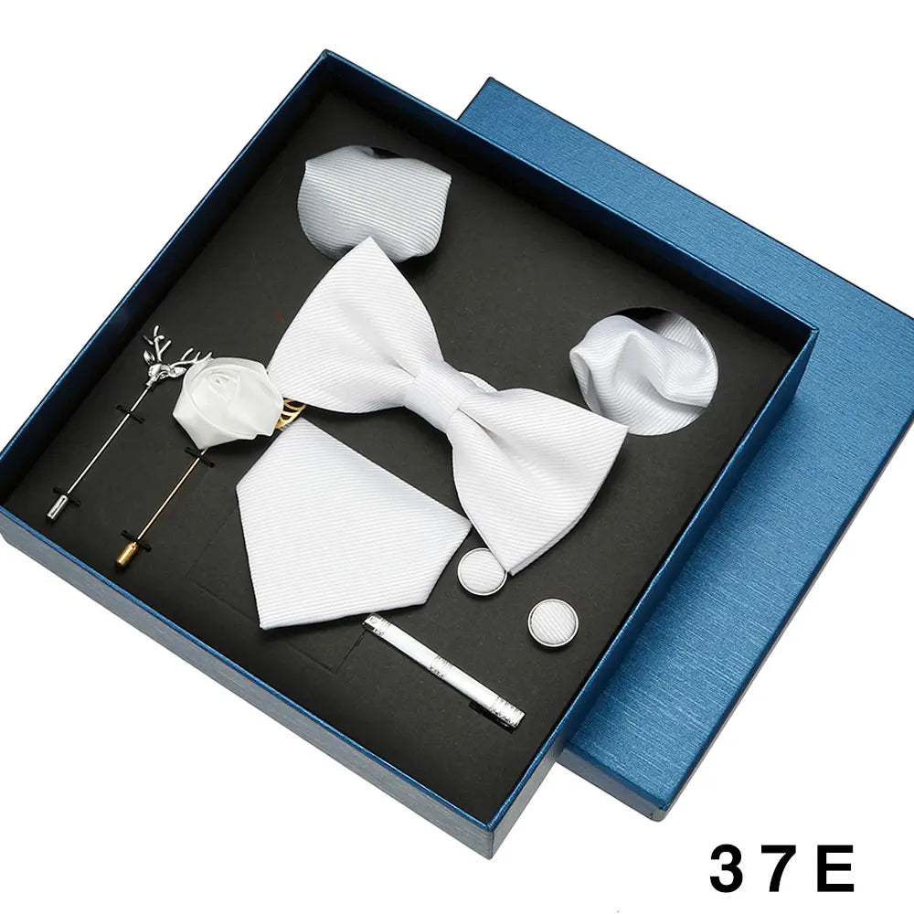 Premium wedding tie collection featuring matching bowtie, pocket square and cufflinks