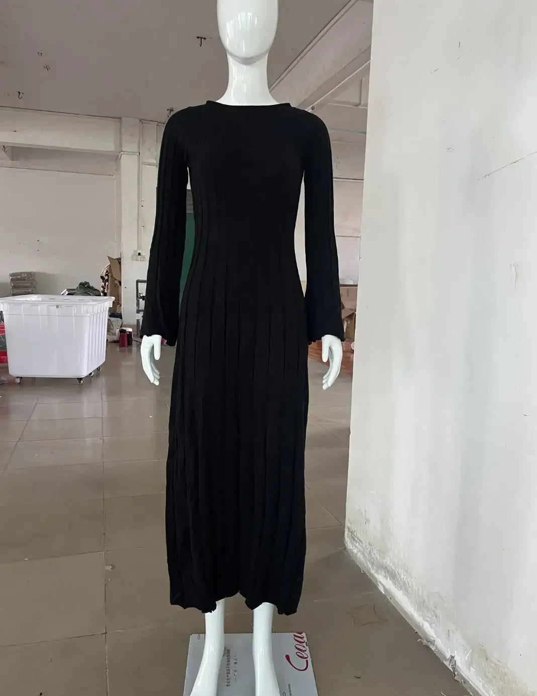 Comfort meets style in this elegant white dress with a flattering silhouette.