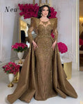 Elegant mermaid gown in shimmering sequined fabric with a high neckline and full sleeves.