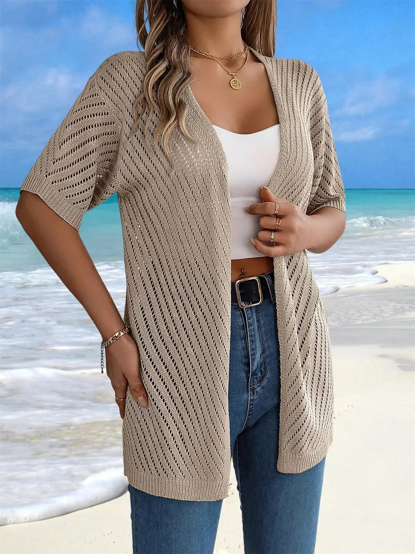 Lightweight viscose crochet cardigan in soft cream, perfect for summer layering.