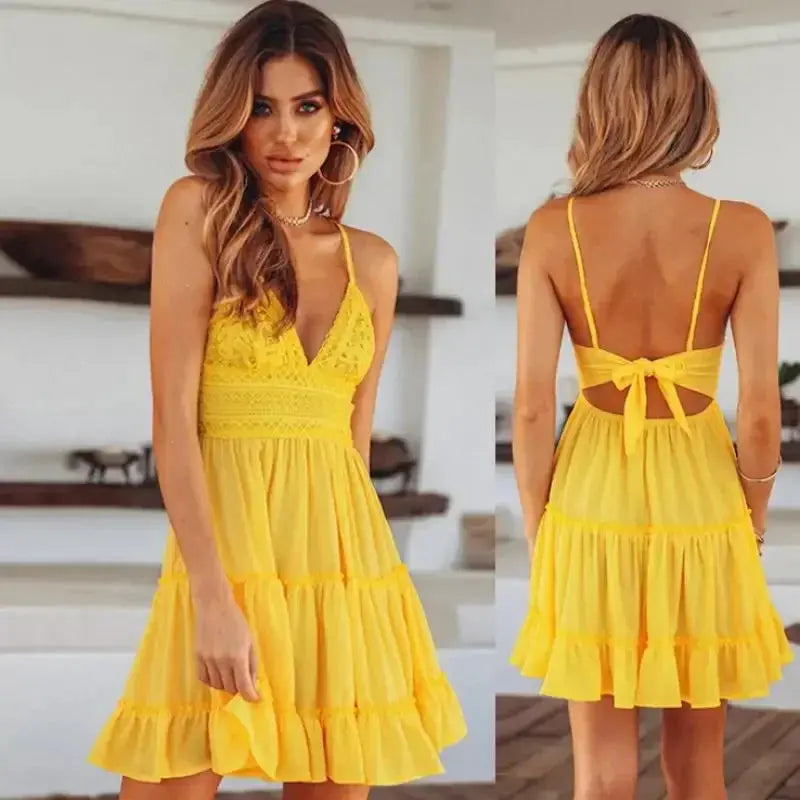 Elegant backless design of the sundress, perfect for sun-kissed summer days at the beach.