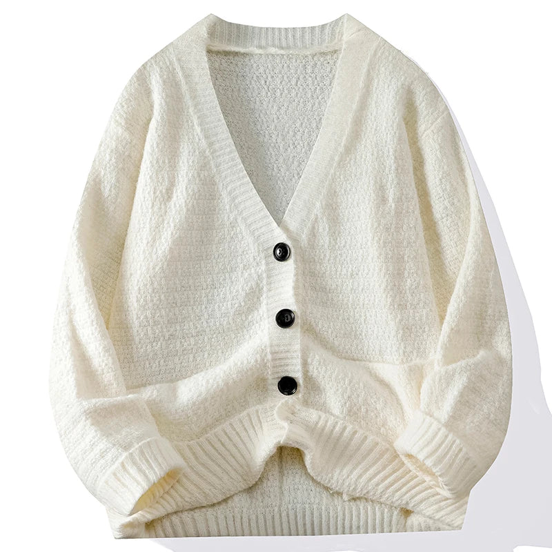 Detail shot of the V-neckline on the Autumn Whisper cardigan, emphasizing its elegant style.