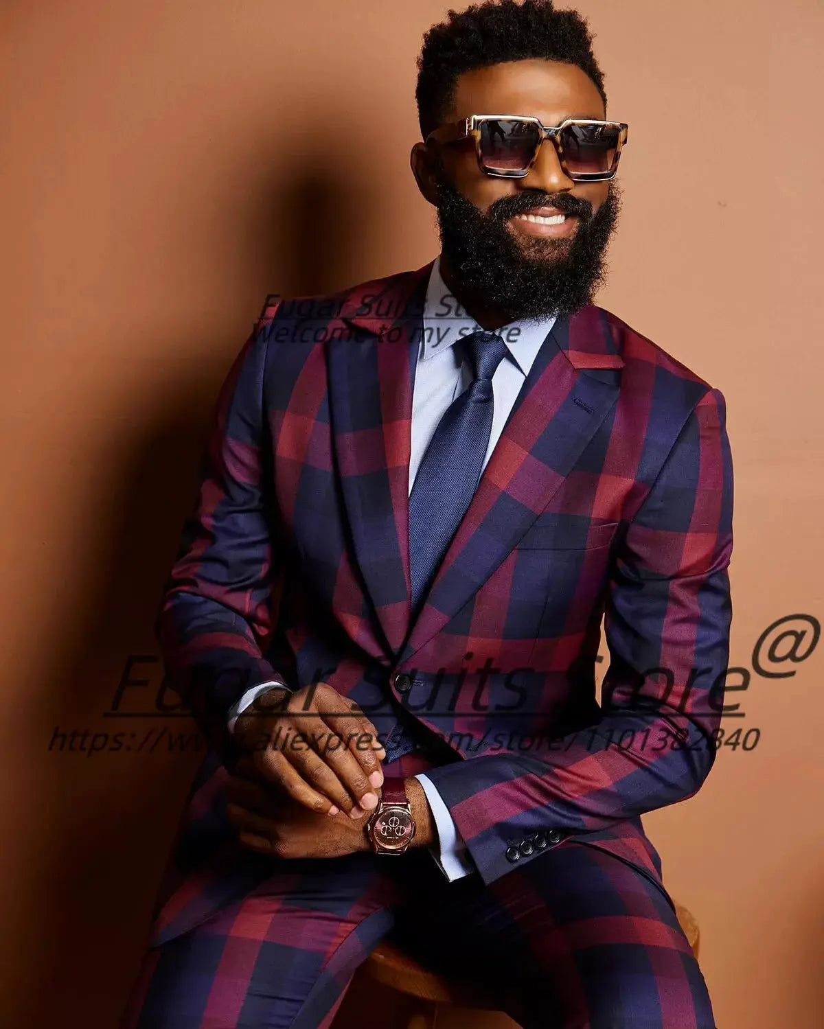Model wearing the Charisma Plaid Prom Suit at a gala, highlighting its elegant design and fit.