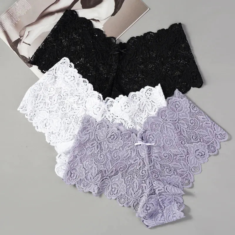 Low-rise Whisper-Soft Lace Briefs with subtle bow detail for added charm.