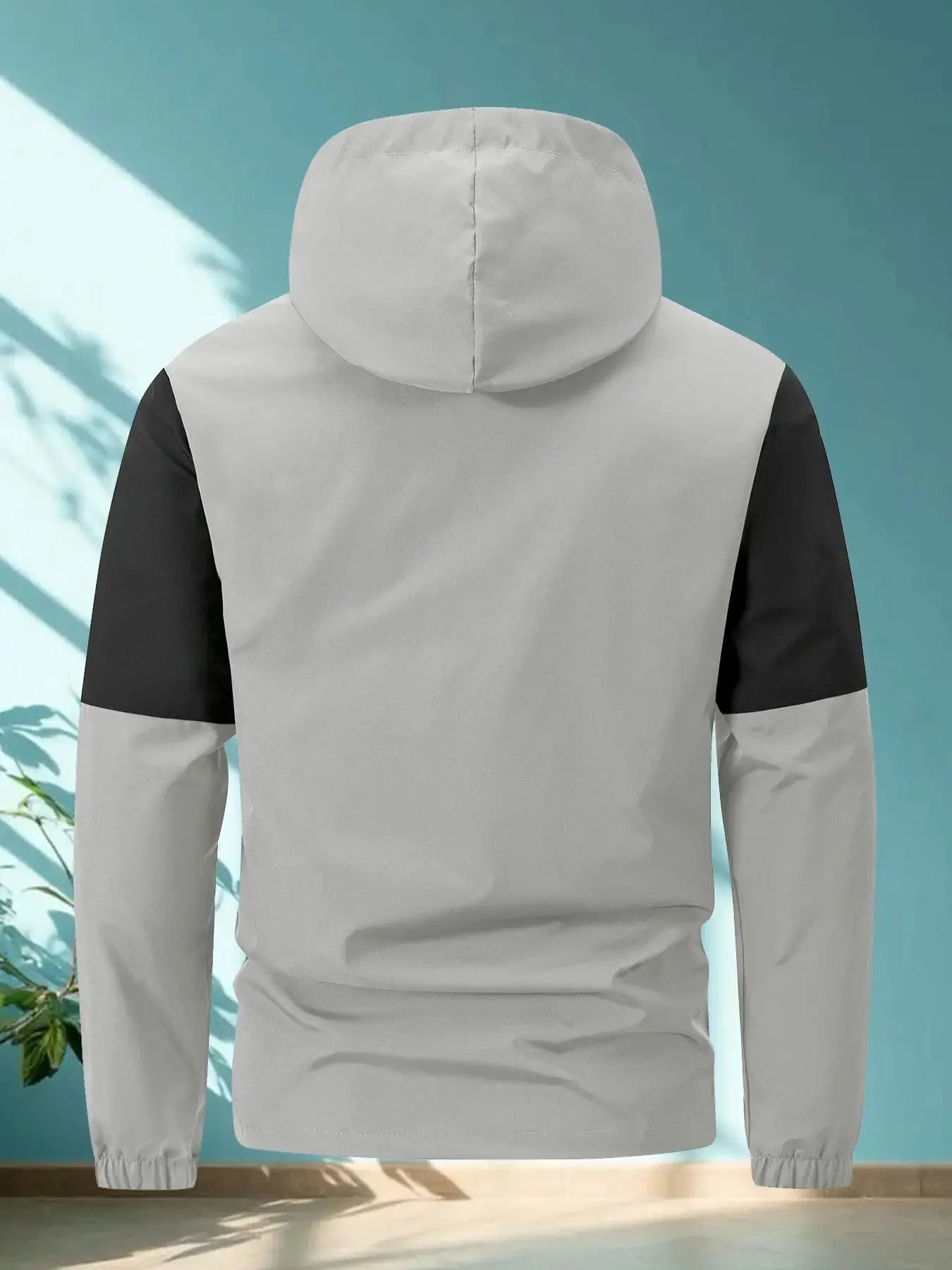 Multiple pockets of the Wind Whisperer jacket, perfect for holding essentials during outdoor adventures.