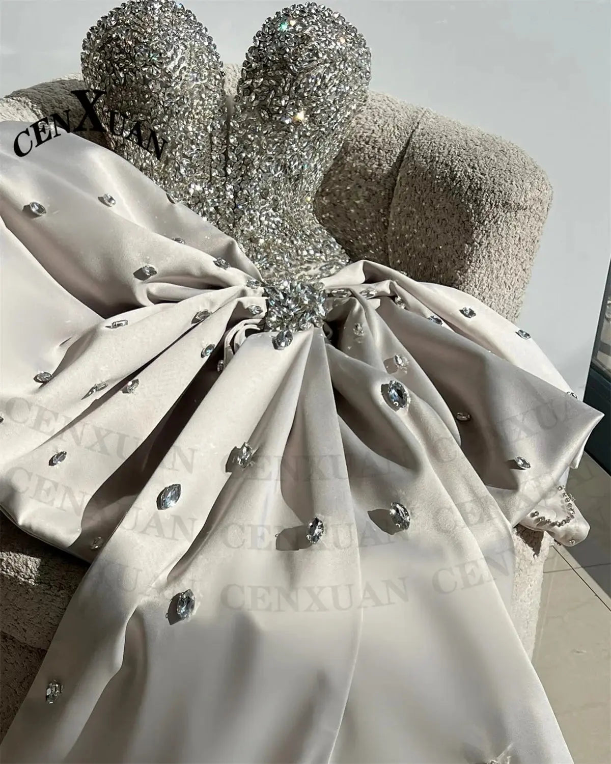 Back view of the Rhinestone Bow Gala Dress, emphasizing the dramatic bow and flattering silhouette.