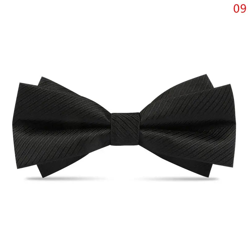 Black bow tie on a mannequin, demonstrating its timeless design and style staple.