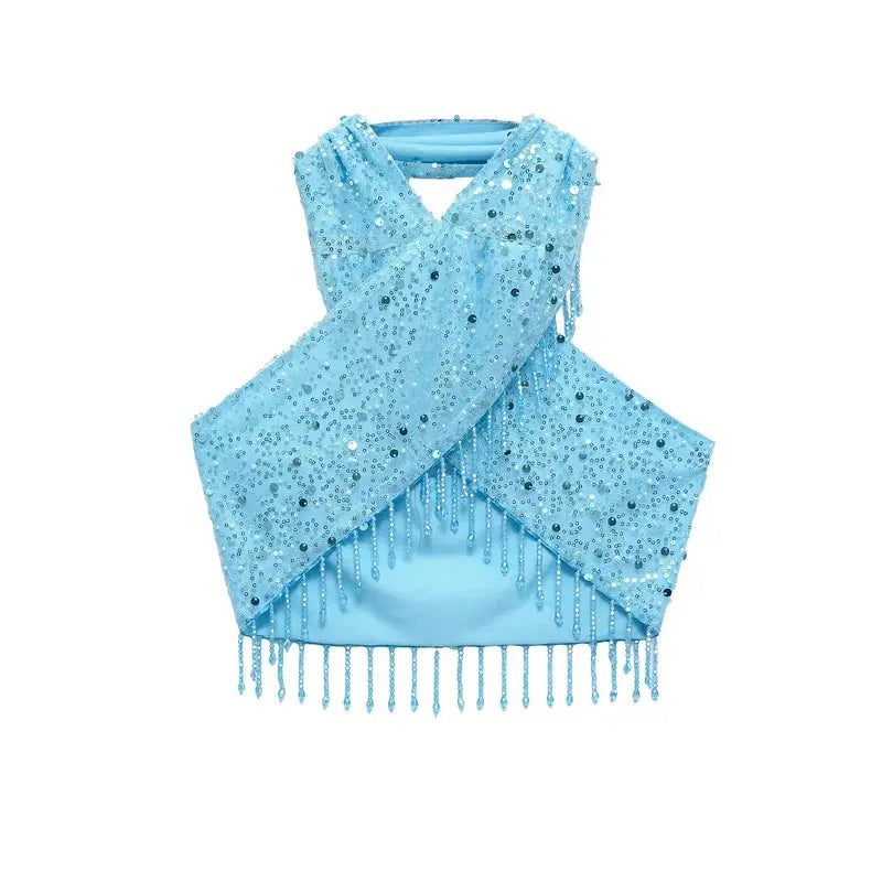 Close-up of luxurious pearl fringe detailing on the halter neck, showcasing chic design.