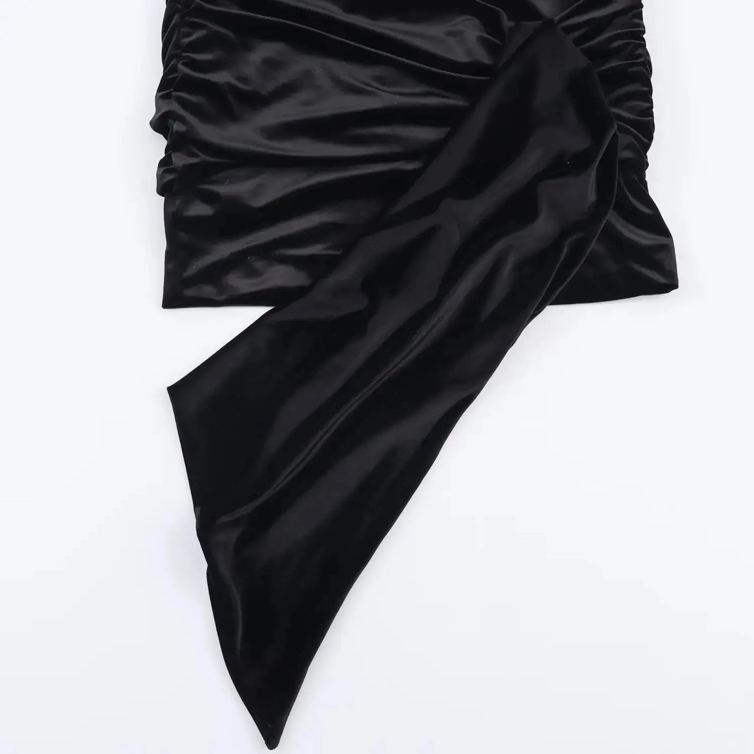 Side profile of the Midnight Charm Mini Dress, emphasizing the tailored waist and flattering empire silhouette.