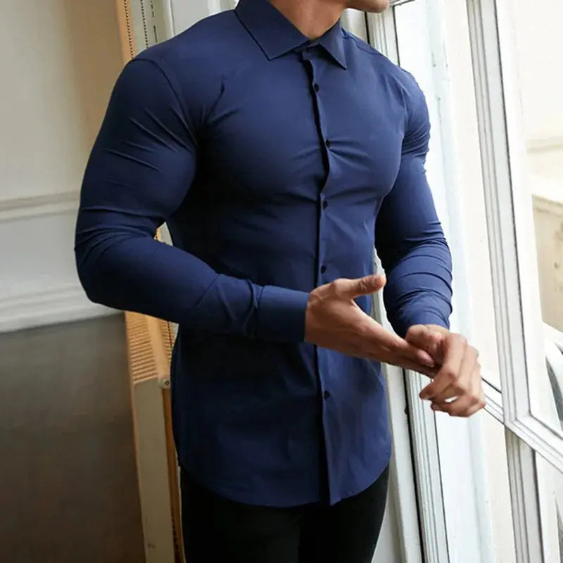 Men's long sleeve shirt in crisp white, featuring a turn-down collar and wrinkle-free fabric.