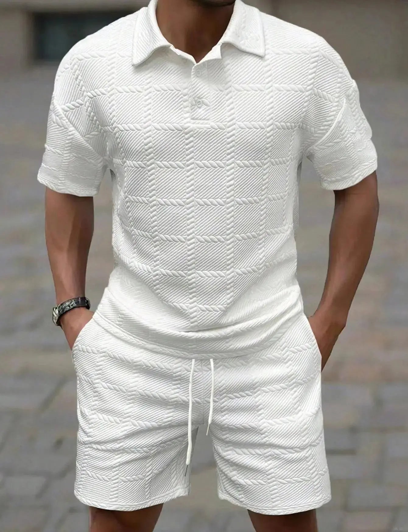 Fashion-forward summer suit with a relaxed fit and clean lines.