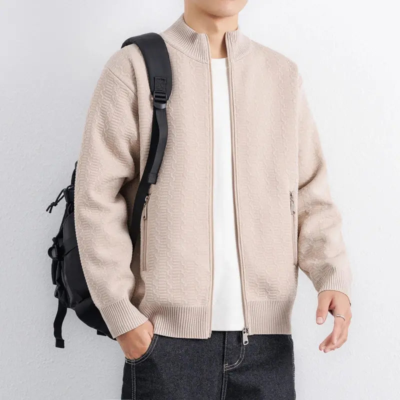 Men's zip cardigan in dark gray with fleece lining for warmth and style.
