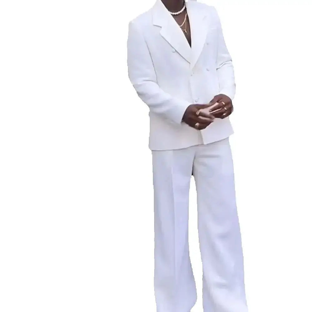 Full view of the white suit, highlighting its elegant silhouette.