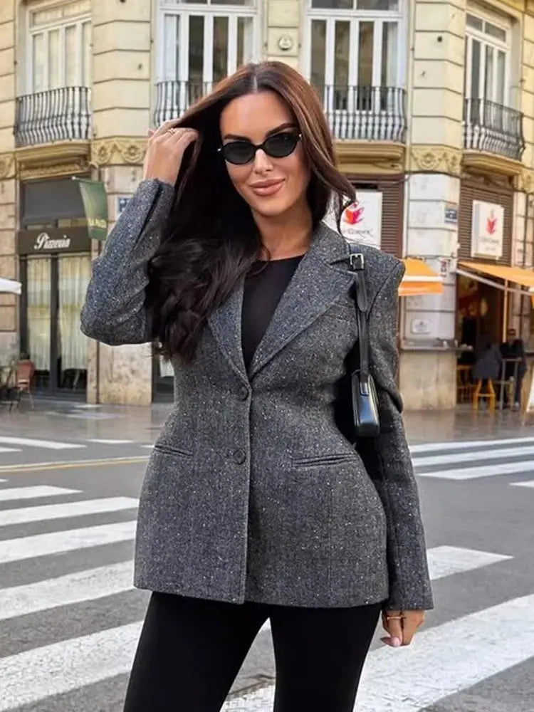 Detail of the notched collar on the chic suit jacket.