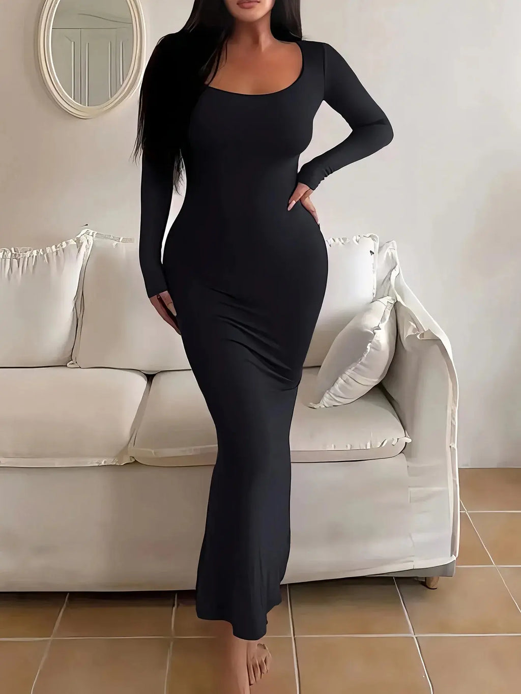 Close-up of the body-hugging fabric of the Midnight Whisper dress, highlighting its smooth texture and stretch.