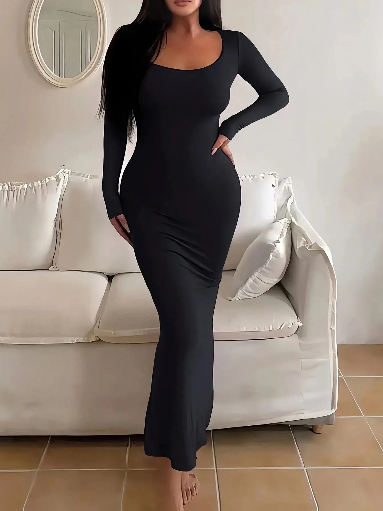 Close-up of the body-hugging fabric of the Midnight Whisper dress, highlighting its smooth texture and stretch.