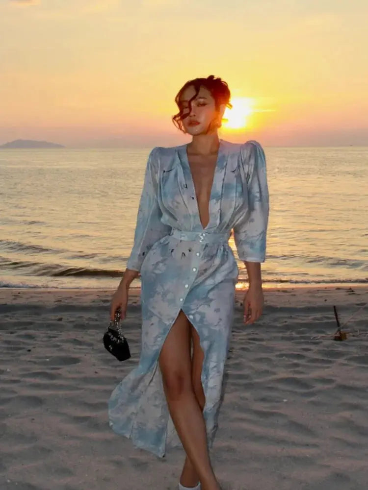 Chic party outfit featuring a flattering deep V-neck and strategically placed high split.