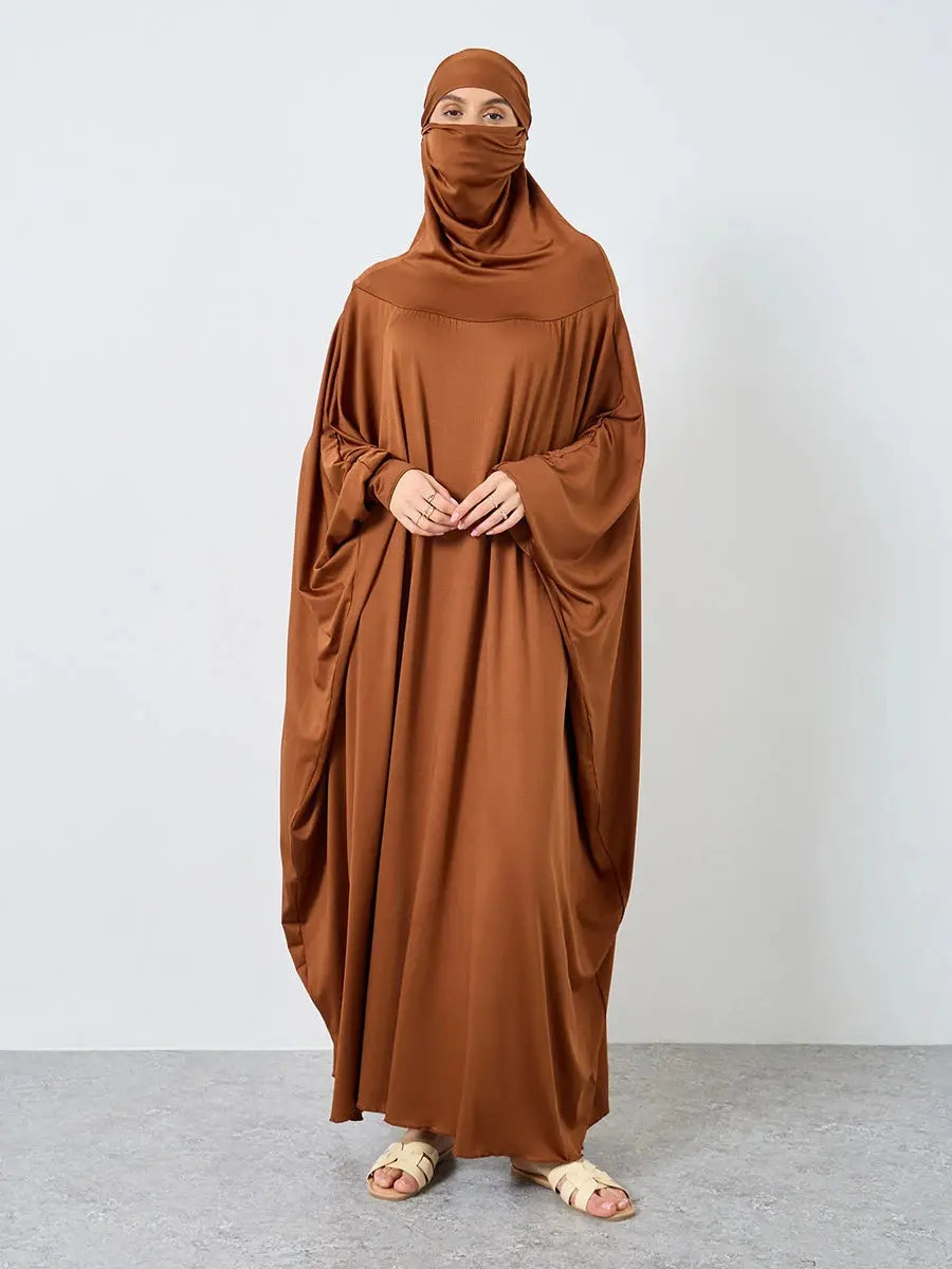 Model wearing the Serene Grace Abaya, embodying confidence and devotion.