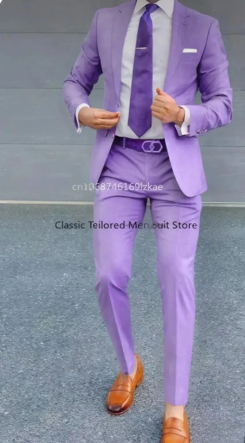 Man adjusting his blazer, demonstrating the fluid movement of the high-quality fabric.