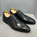 Rubber outsole of green Oxford shoes providing stability and comfort.