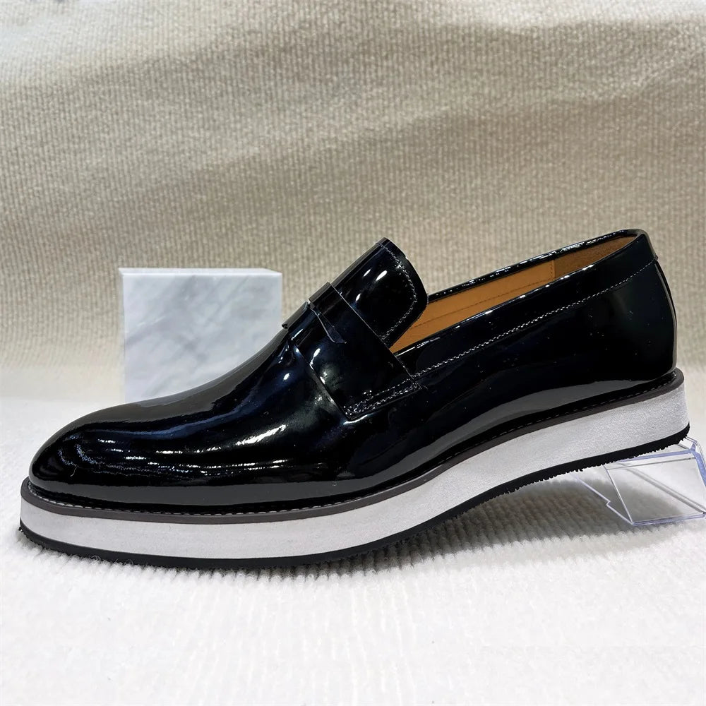 Premium genuine leather pointed loafers in black with breathable construction and flexible fit