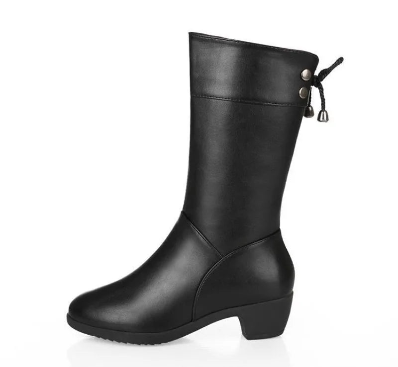 Winter leather boots featuring side zipper closure and supportive square heel