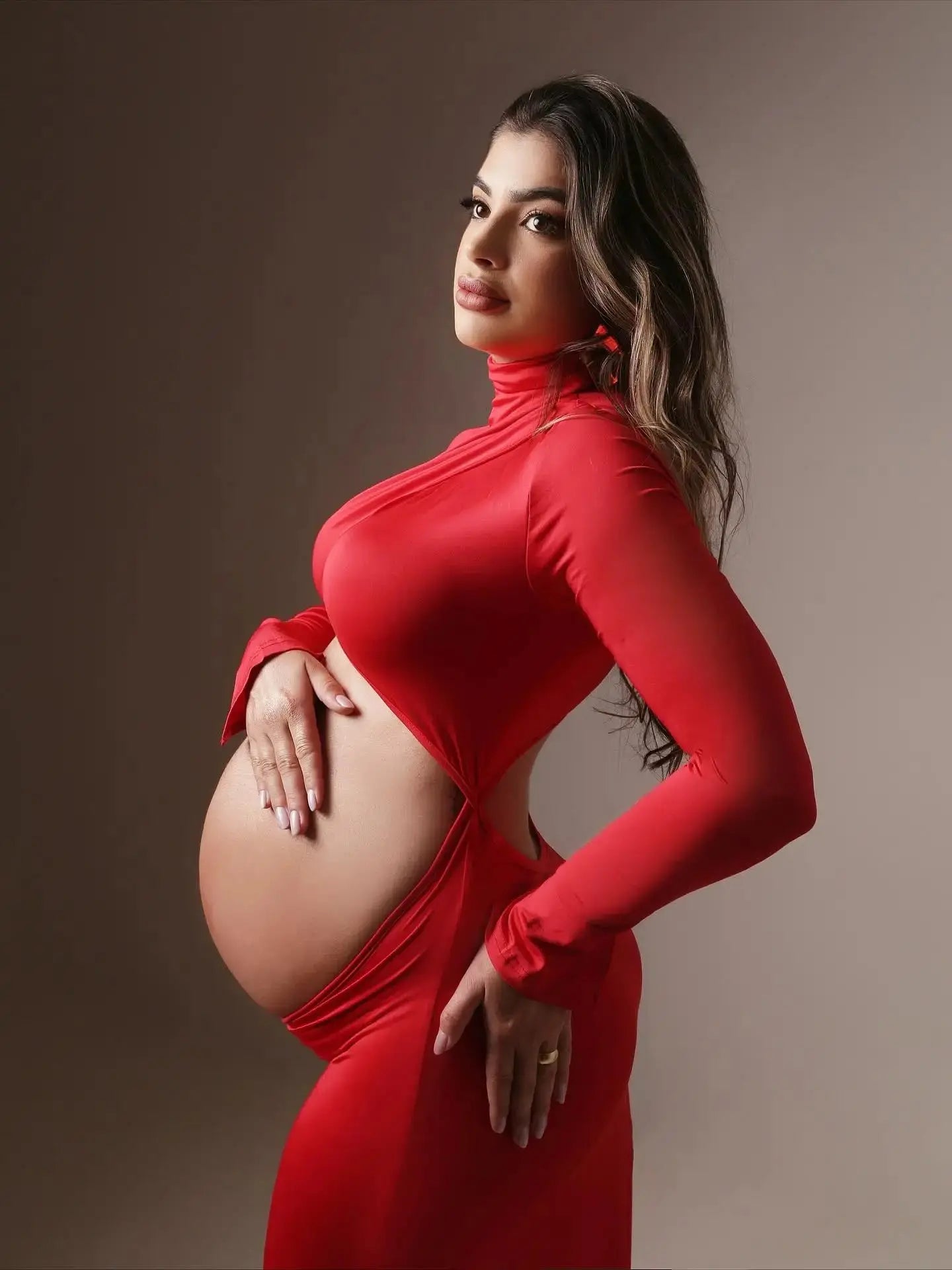 Elegant floor-length maternity gown, crafted from lightweight voile, perfect for capturing special moments.