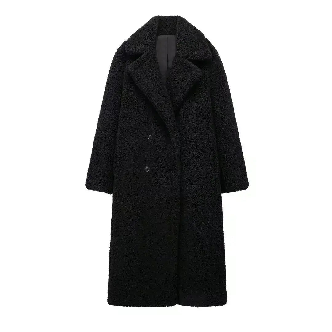 Flat lay of the Winter Whisperer coat with autumn accessories, perfect for stylish winter fashion.