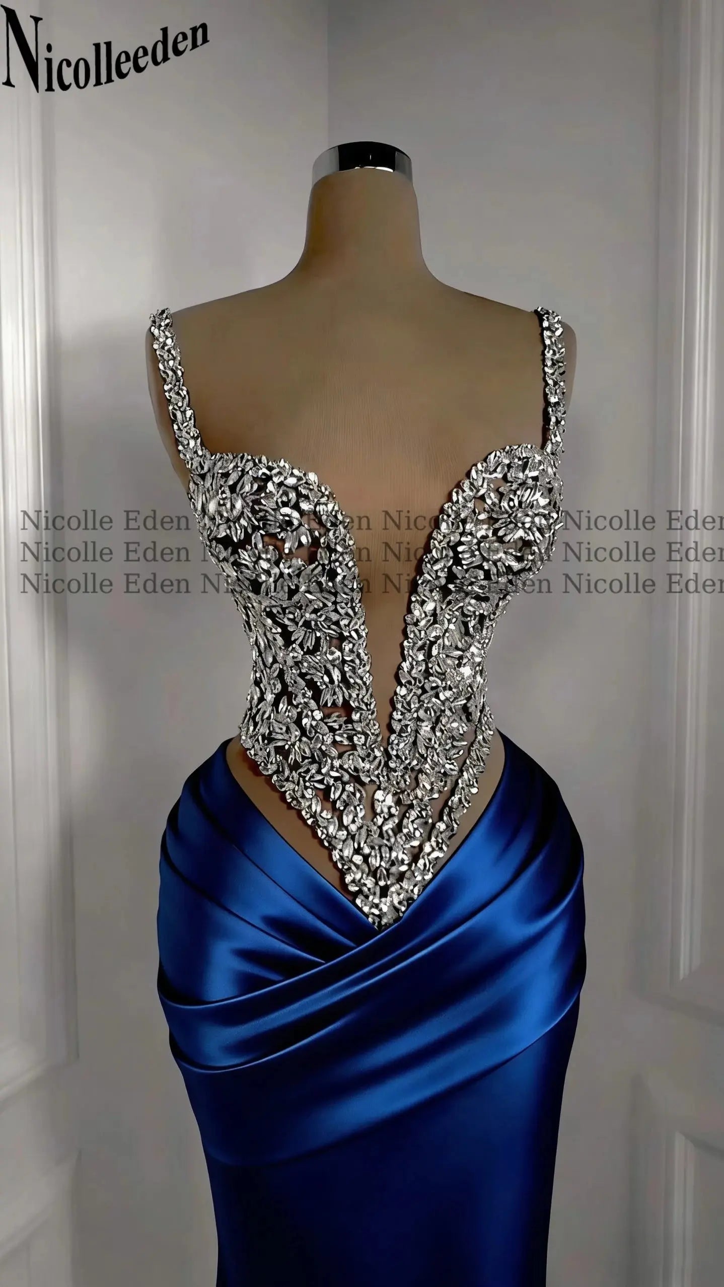 Close-up of the satin fabric of the Rhinestone Gala Gown, highlighting its smooth texture.