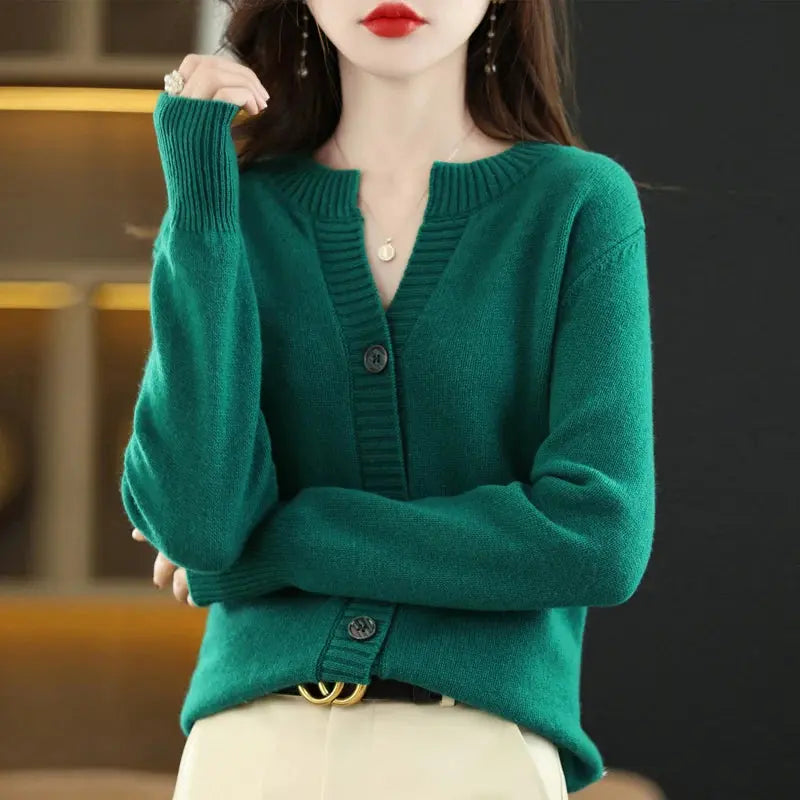 Back view of the cardigan highlighting its relaxed silhouette.