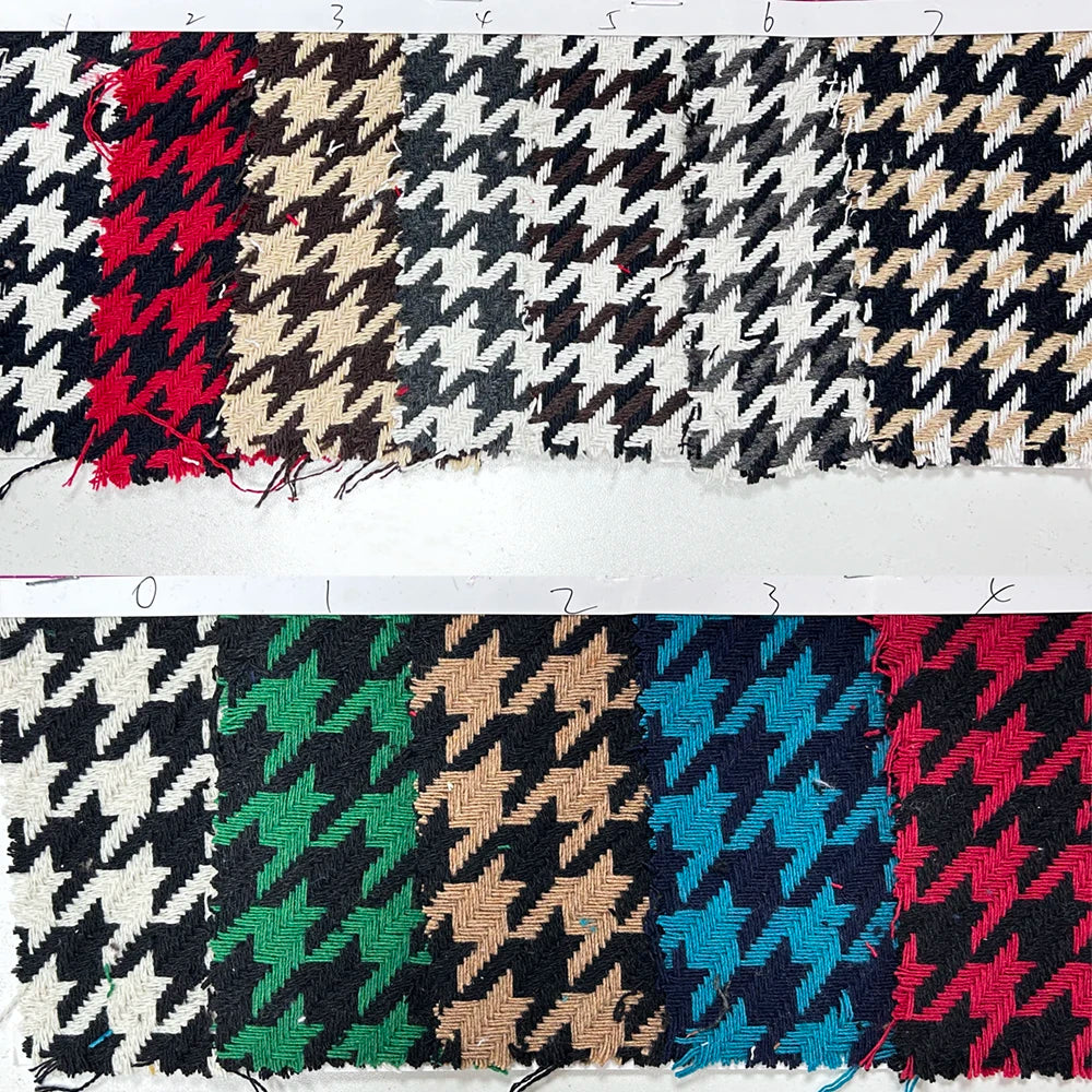 Model wearing the houndstooth suit, exuding confidence in a professional setting.