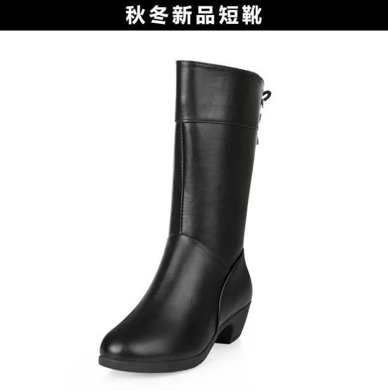 Women's mid-calf boots with premium leather exterior and warm plush interior