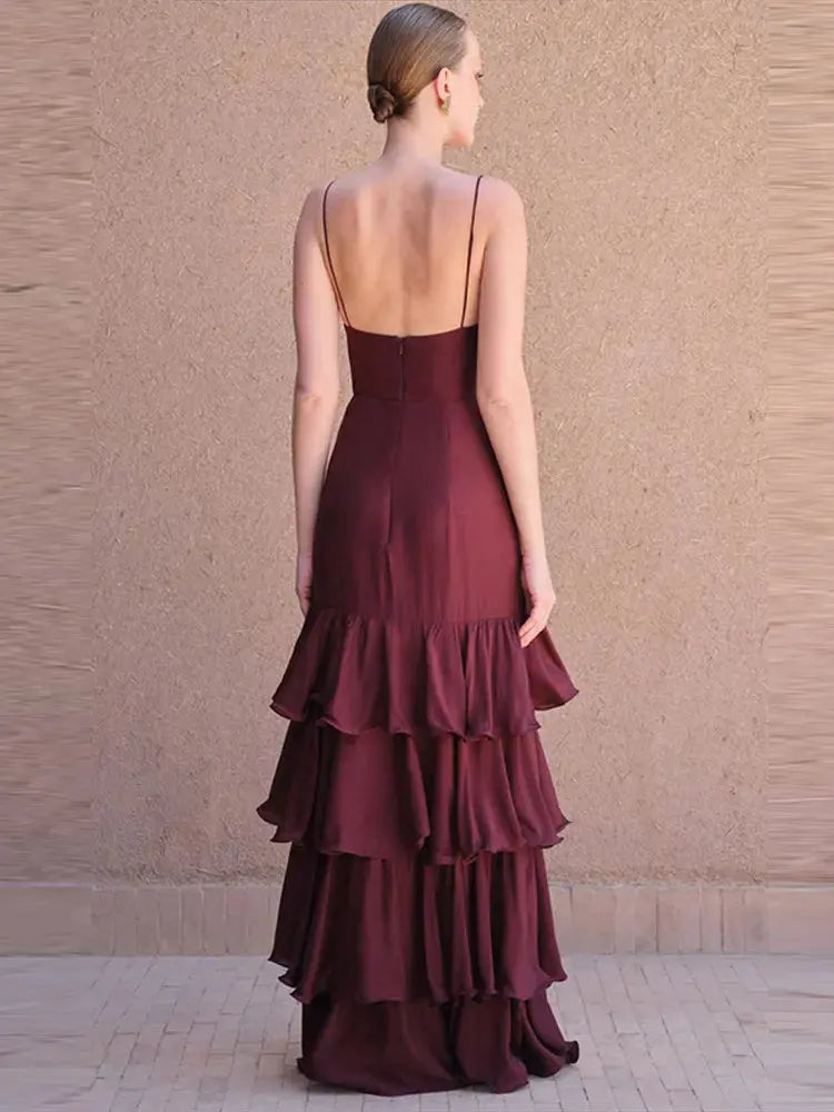 Back view of the halter gown, emphasizing the elegant backless design.