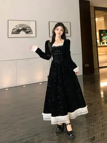 Midnight Whispers Velvet Dress in spring setting, perfect for transitional season styling.