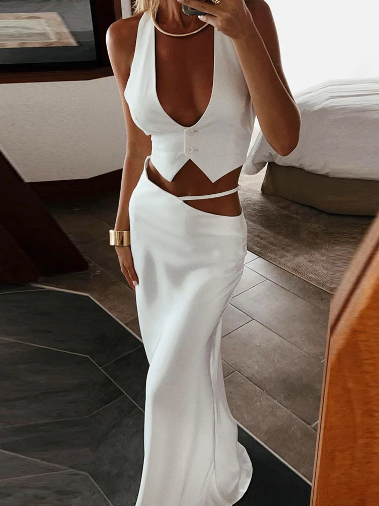 Silk Whisper Set ensemble displayed on a hanger, emphasizing its glamorous appeal.