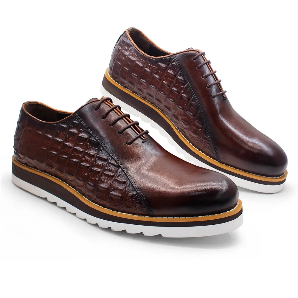 Black crocodile-pattern leather oxford dress shoes with textured embossed finish on white background