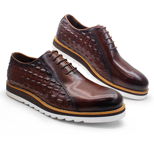 Black crocodile-pattern leather oxford dress shoes with textured embossed finish on white background