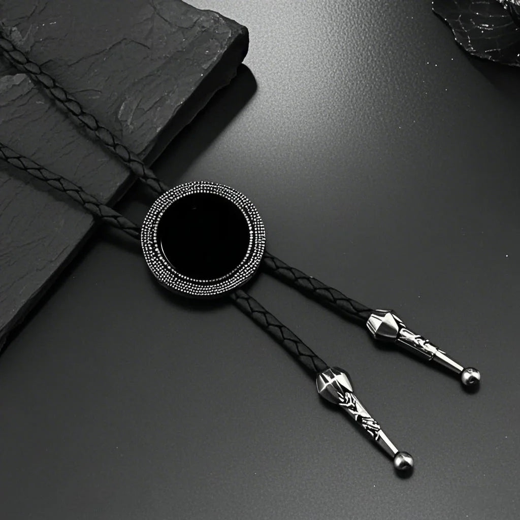 Bold fashion statement bolo tie glinting at a collar in a stylish setting.