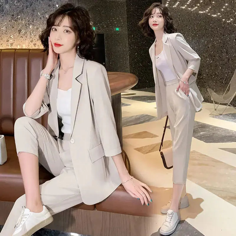 Green blazer and pants set made of cotton, polyester, and spandex for a tailored fit.