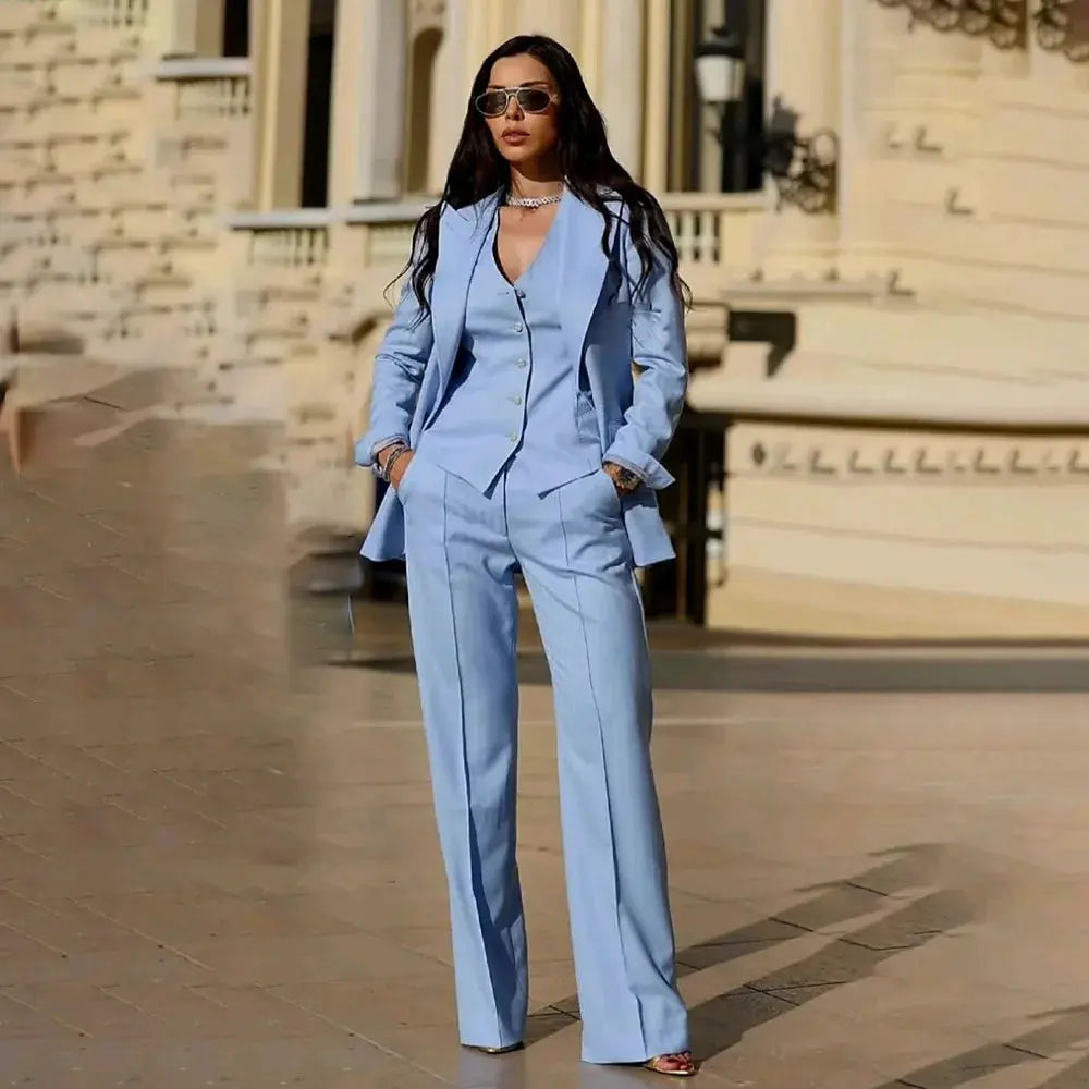 Three-piece tailored suit in navy blue, perfect for commanding the room.