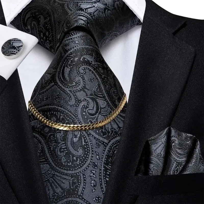 Elegant gold tie accessory with warm metallic finish for professional attire