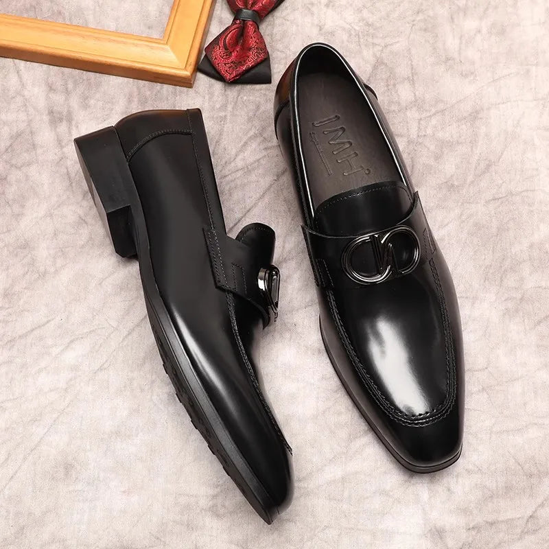 Side view of men's loafers, showcasing round toe and sleek polished finish.