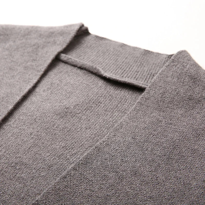 Functional pockets of the Autumn Whisper cardigan, perfect for securely storing essentials while maintaining style.
