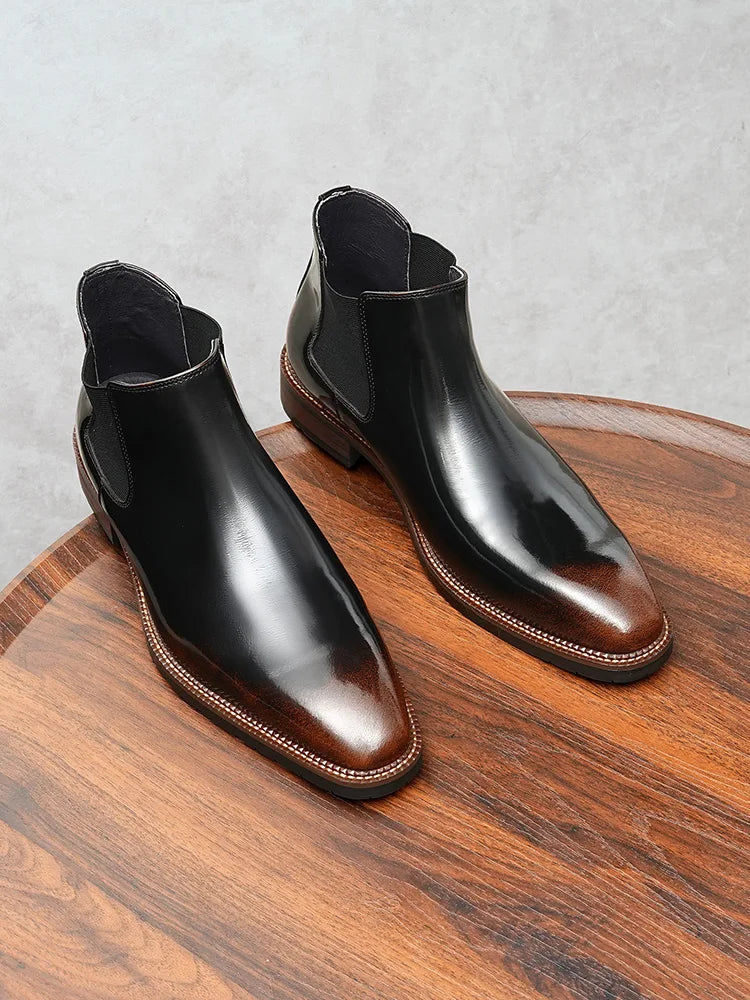 Professional burgundy Chelsea boots in premium cowhide leather with classic slip-on design