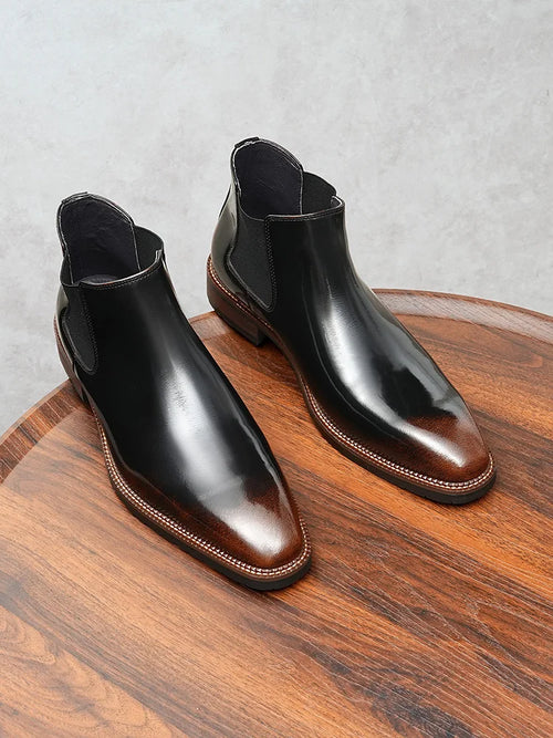 Professional burgundy Chelsea boots in premium cowhide leather with classic slip-on design