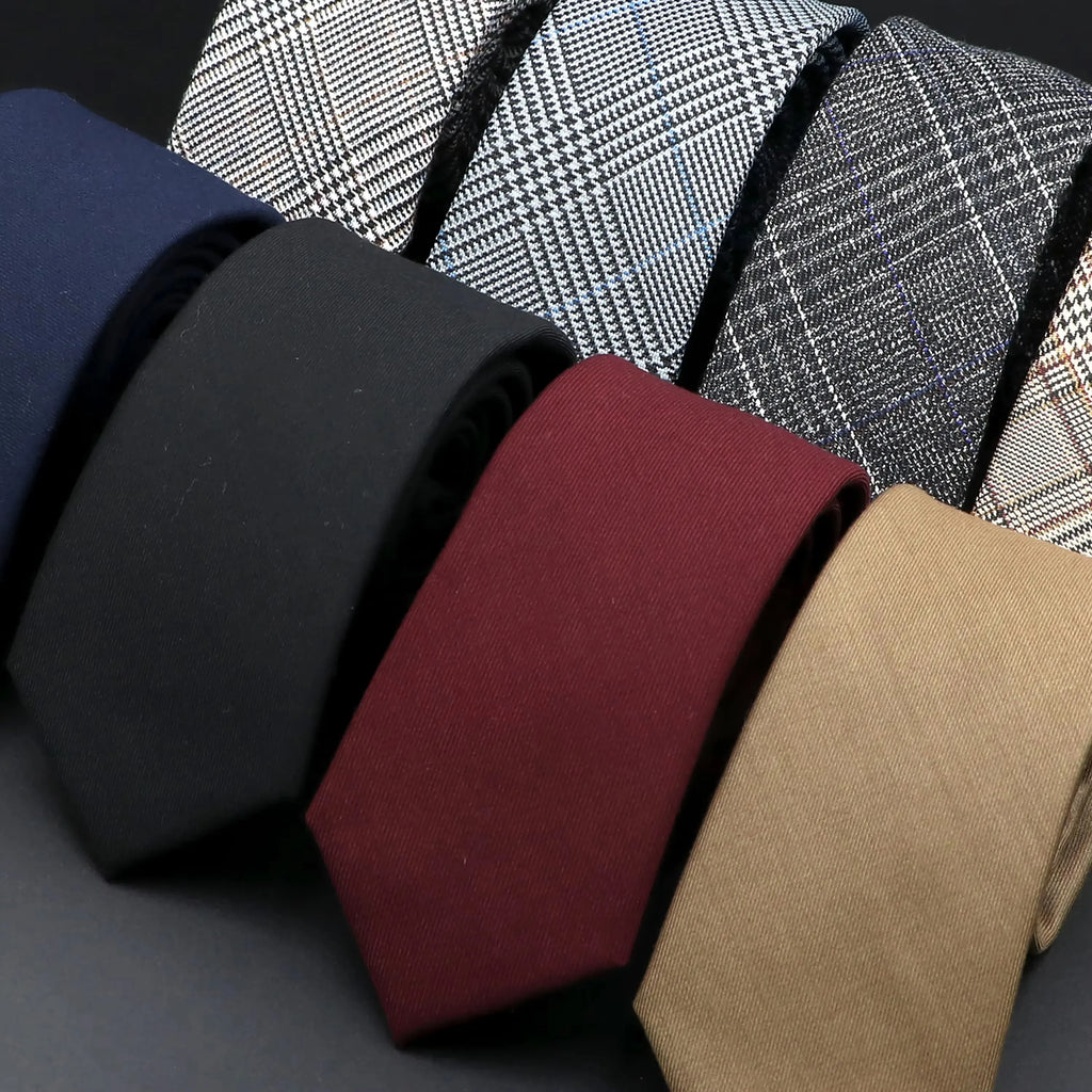 Sleek black tie made from premium cotton, perfect for formal occasions.